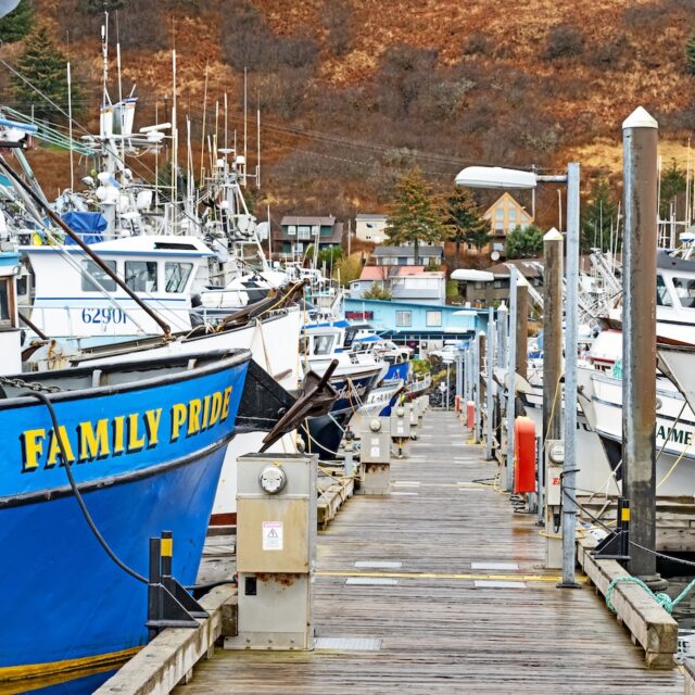 Kodiak, Alaska - May 1 2024: fishing boats are moored at the jetty in St. Paul Harbor, Kodiak.